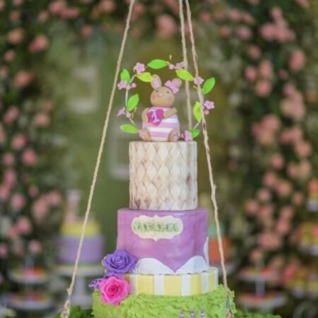 baby bunny cake on a swing